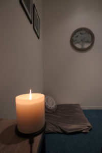 An inside view of the Mad Men Marketing meditation room, complete with a lit candle