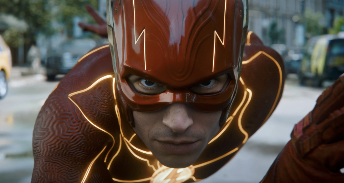 A close-up shot of Ezra Miller running toward the camera as The Flash, Barry Allen