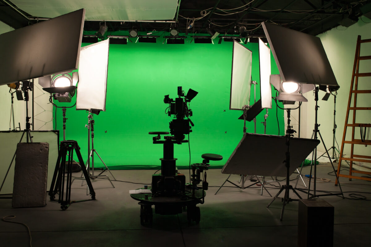 Shooting studio with professional equipment and green screen